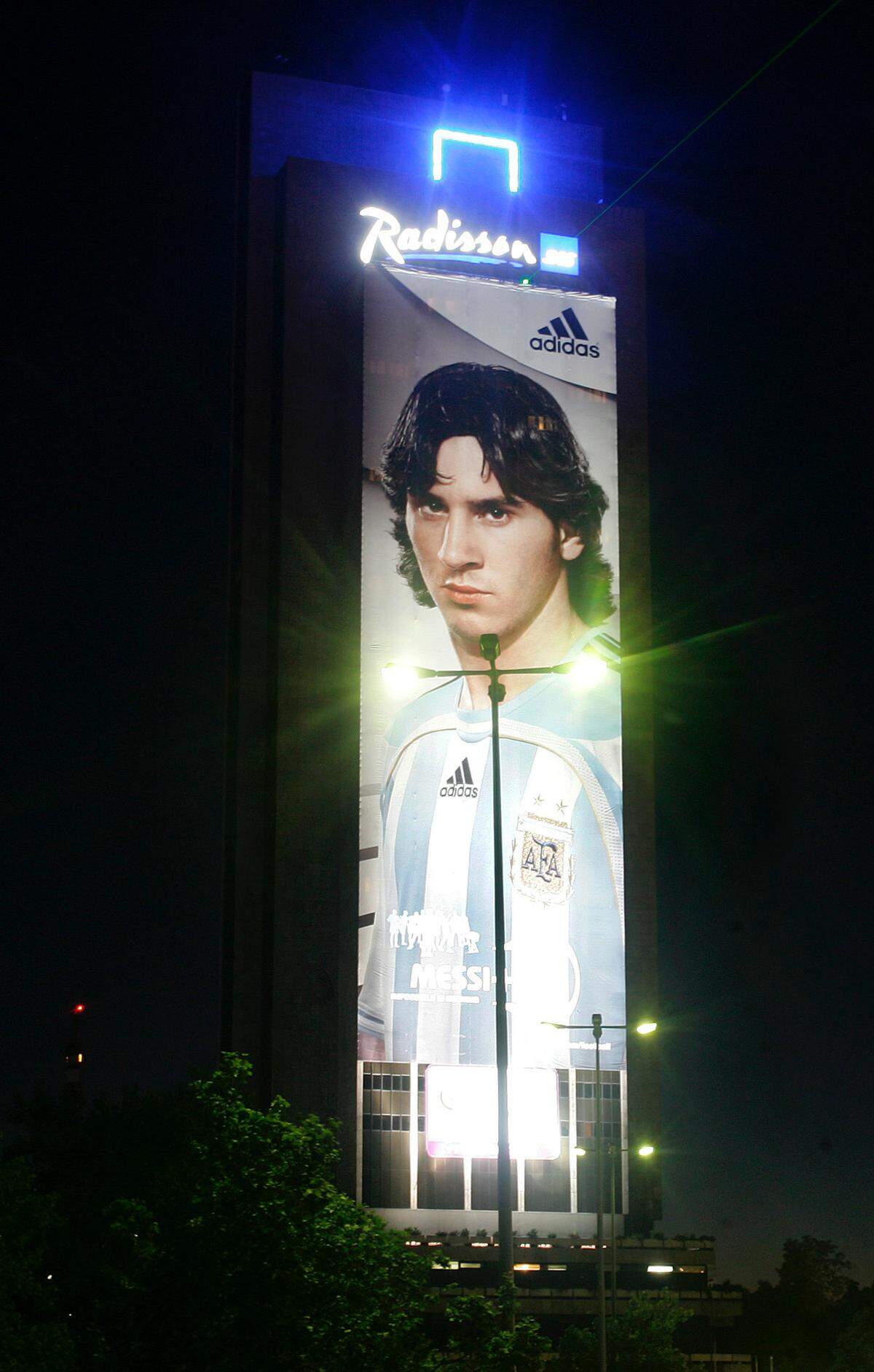 An advertising poster showing Argentinian player Lionel Messi is seen at the Radisson hotel in downtown Hamburg, northern Germany, late Sunday, June 11, 2006. Argentina will play in group C of the World Cup against Serbia and Montenegro and The Netherlands. (AP Photo/Fabian Bimmer)