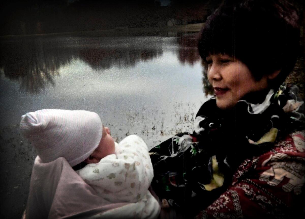 On a visit to Columbia in 2018, Ke Ren was able to spend time with her infant granddaughter. Now she is hoping to gain custody of the girl.