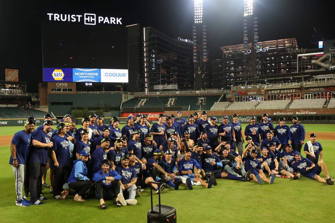 The Kansas City Royals pose for a team photo after clinching a wild card playoff birth after a game against the Atlanta Braves at Truist Park.