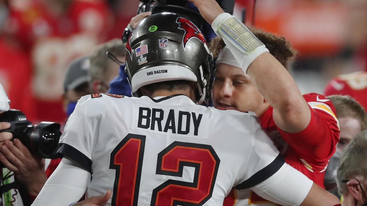 Tampa Bay Buccaneers quarterback Tom Brady and Kansas City Chiefs quarterback Patrick Mahomes meet up after the Buccaneers defeated the Chiefs 31-9 Sunday, February 7, 2021, at Super Bowl LV at Raymond James Stadium in Tampa, Florida.