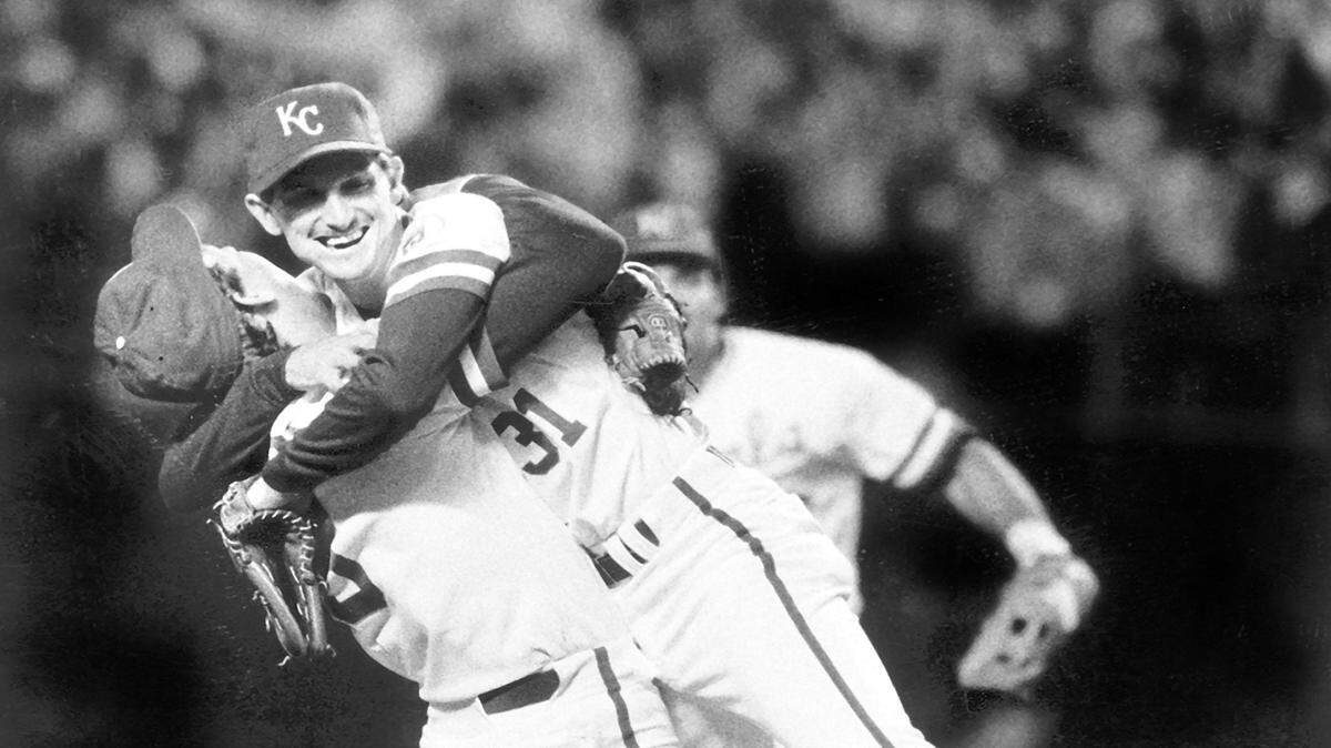 Pitcher Bret Saberhagen leaped into the arms of third baseman George Brett after the Royals won the World Series in 1985.