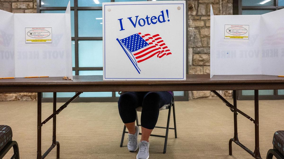 A voter casts their ballot for the general election at Country Club Christian Church on Tuesday, Nov. 5, 2024, in Kansas City.