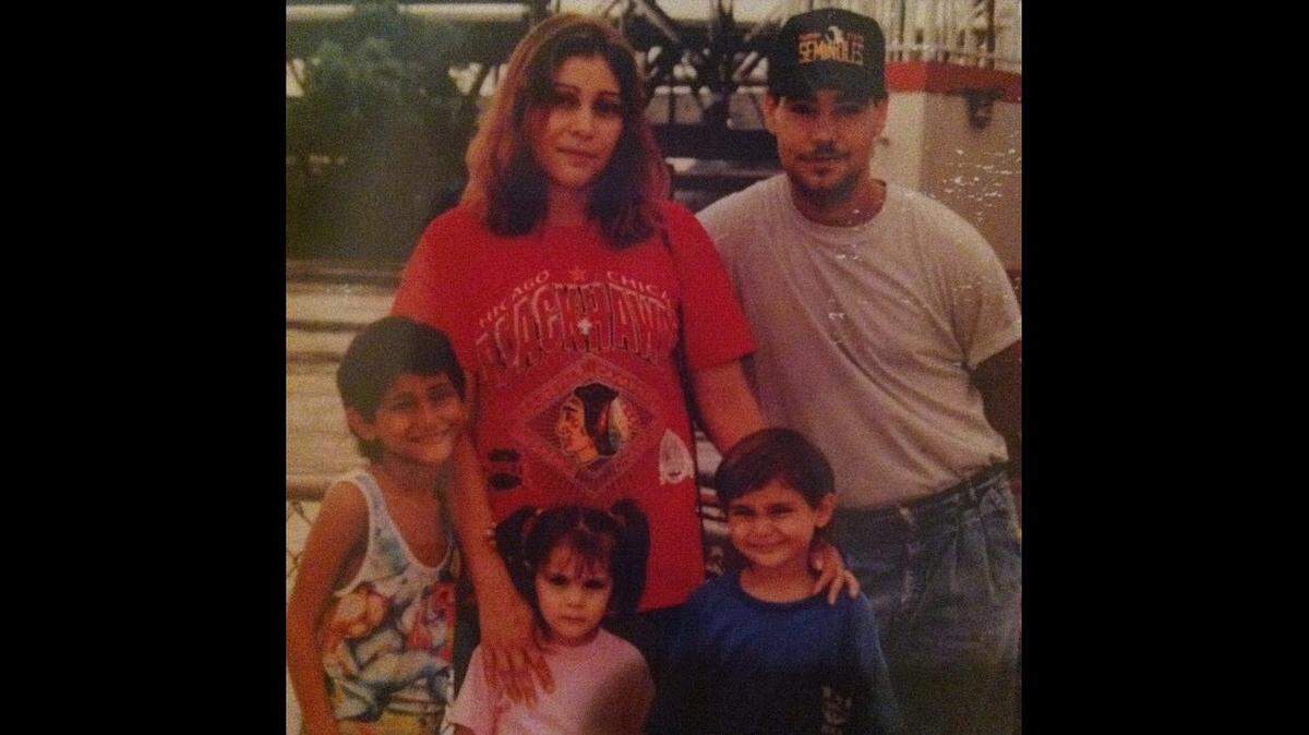 Pyet DeSpain’s family gathers together for a family photograph in 1994. Top row: Delfina Segura, Tony DeSpain. Bottom row: Tony DeSpain, Pyet Stephanie DeSpain and Jacinto Segura.