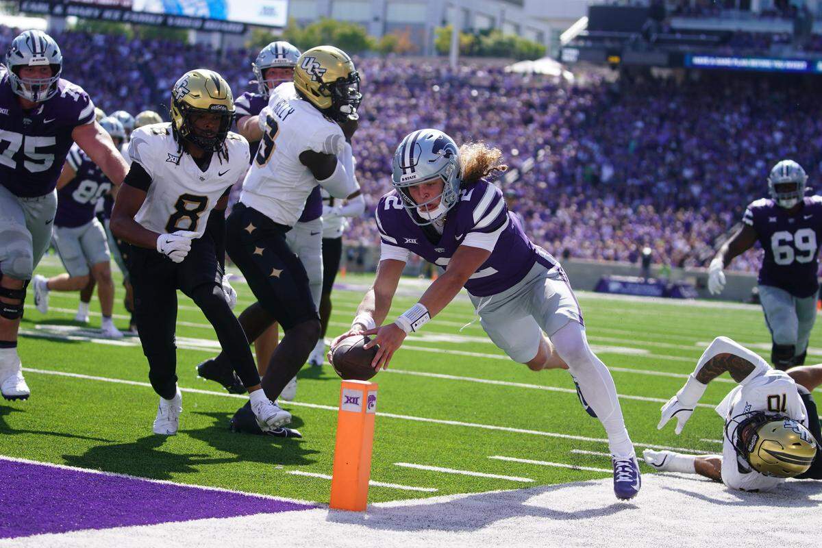 Kansas State Wildcats quarterback Avery Johnson dives for the end zone pylon against the UCF Knights at Bill Snyder Family Stadium in Manhattan, Kansas on Saturday, Sept. 27, 2025.