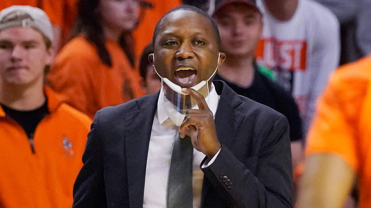 Cleveland State head coach Dennis Gates shouts in the second half of an NCAA college basketball game against Oklahoma State, Monday, Dec. 13, 2021, in Stillwater, Okla. (AP Photo/Sue Ogrocki)
