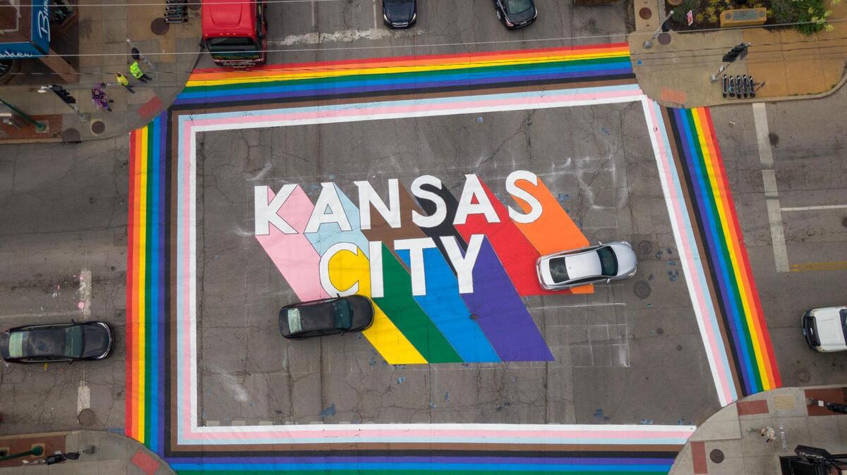With support from LGBTQ Commission of Kansas City, volunteers showed up and painted over two days to complete “Crosswalks to Pride,” a rainbow crosswalk with the words ‘Kansas City’ emblazoned across the intersection of Broadway Boulevard and Westport Road on Tuesday, June 6, 2023 in Kansas City. June is LGBT Pride Month and events are scheduled thoughout the month.