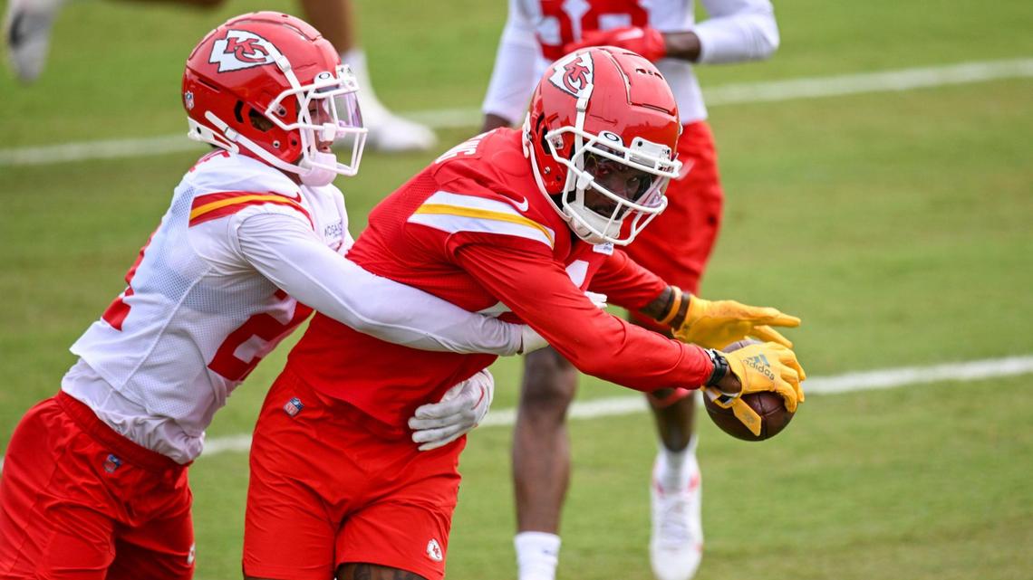Chiefs cornerback Trent McDuffie (21) goes after wide receiver Marquez Valdes-Scantling (11) during training camp on Friday, July 29, 2022 at Missouri Western State University, in St. Joseph, Missouri.