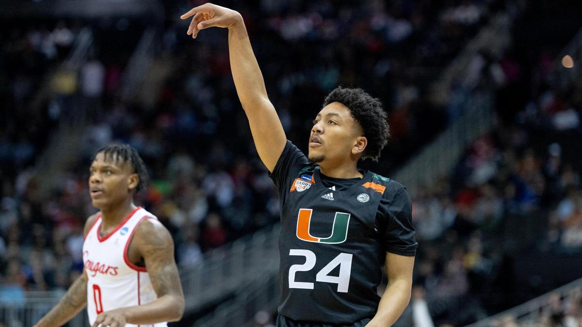 Miami guard Nijel Pack (24) watches a 3-point shot against Houston during a Sweet 16 game in the Midwest Regional of the NCAA Tournament Friday, March 24, 2023, in Kansas City.