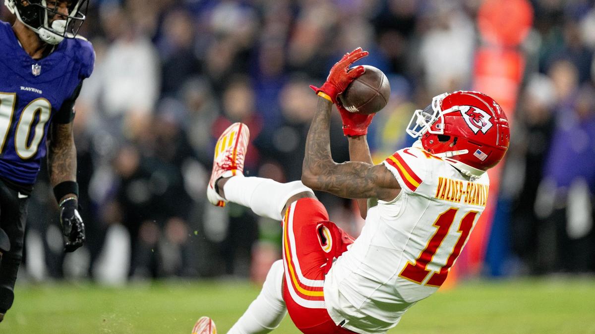 Kansas City Chiefs wide receiver Marquez Valdes-Scantling (11) secures a catch for a first down behind Baltimore Ravens cornerback Arthur Maulet (10) during the AFC Championship Game on Sunday, Jan. 28, 2024, in Baltimore.
