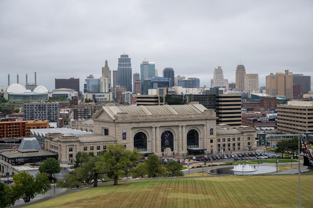 Rain clouds loom over the Kansas City skyline on the first day of fall, Sunday, Sept. 22, 2024.