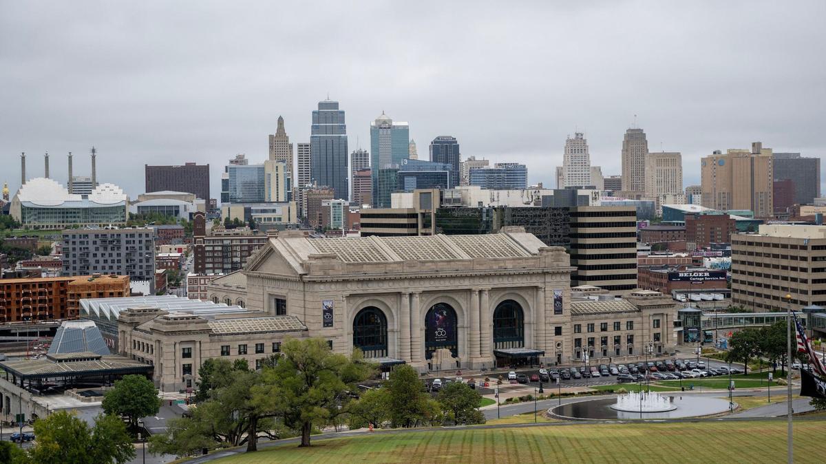 Rain clouds loom over the Kansas City skyline on the first day of fall, Sept. 22. More than 20,000 Kansans hopped the state line between 2022 and 2023 to become Missouri residents.