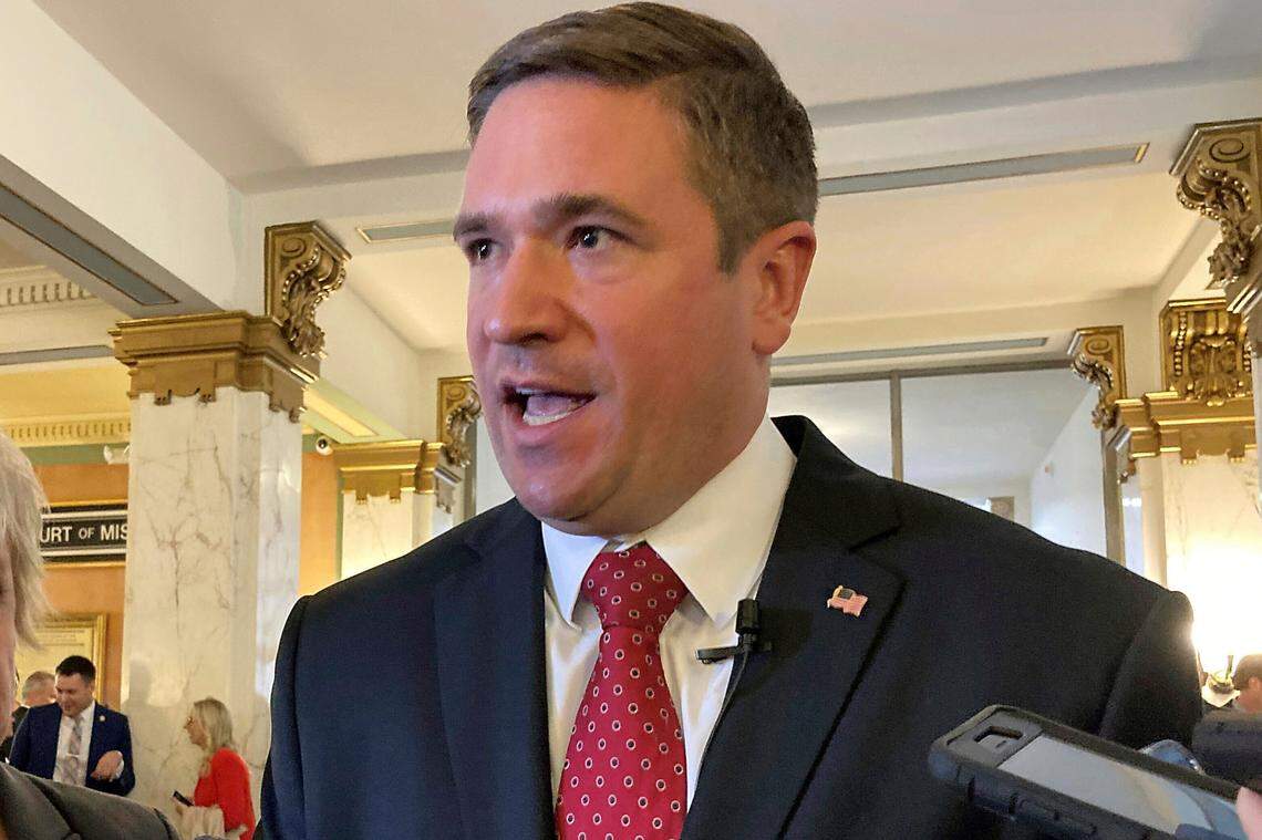 A file photo shows Missouri Attorney General Andrew Bailey speaking to reporters.