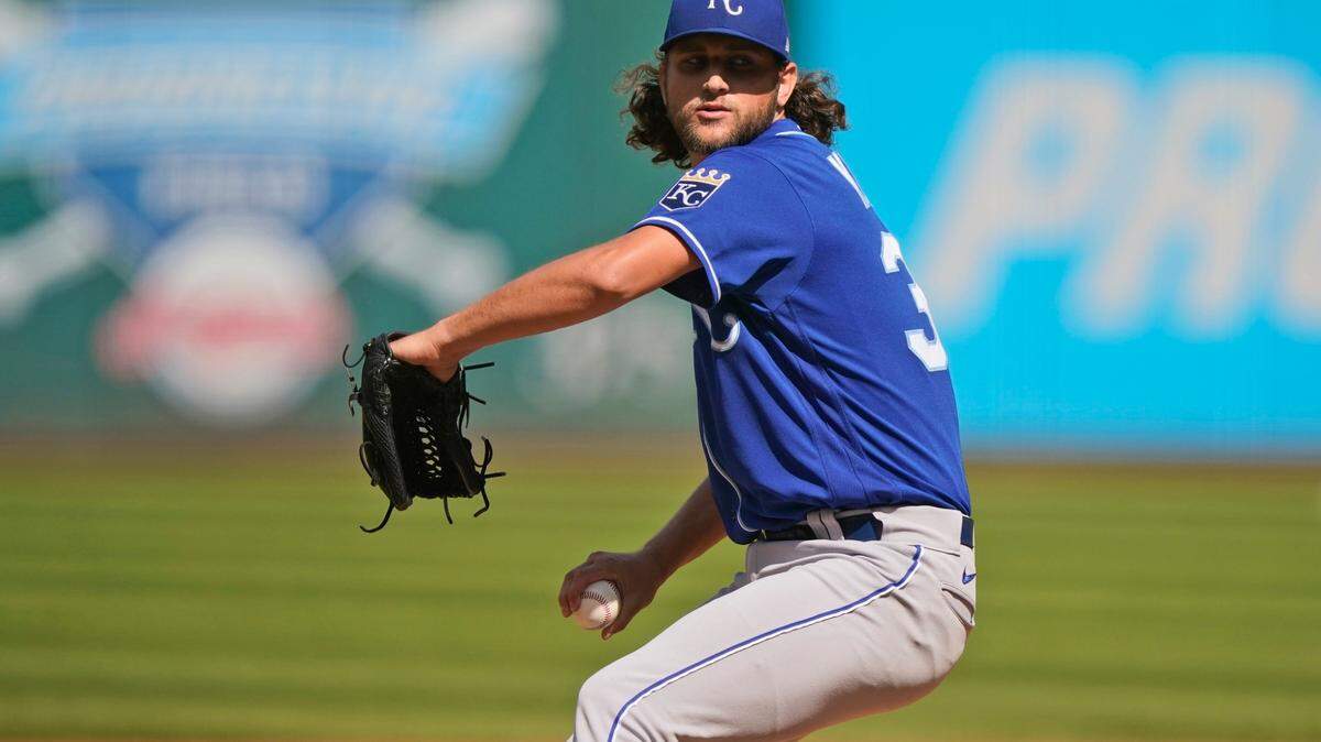 Kansas City Royals starting pitcher Jackson Kowar delivers in the first inning of a baseball game against the Cleveland Indians, Monday, Sept. 27, 2021, in Cleveland. (AP Photo/Tony Dejak)