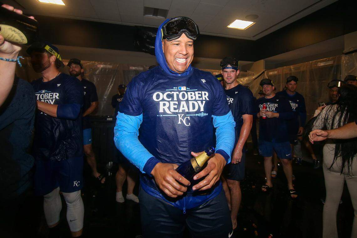 Kansas City Royals catcher Salvador Perez (13) celebrates after clinching a wild card playoff birth after a game against the Atlanta Braves at Truist Park.
