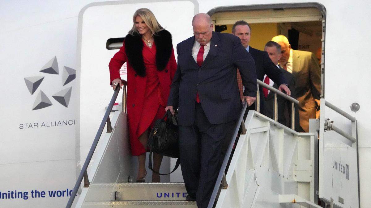Feb 4, 2024; Las Vegas, NV, USA; Kansas City Chiefs coach Andy Reid and wife Tammy Reid exit plane during Super Bowl 58 team arrivals at the Harry Reid International Airport.