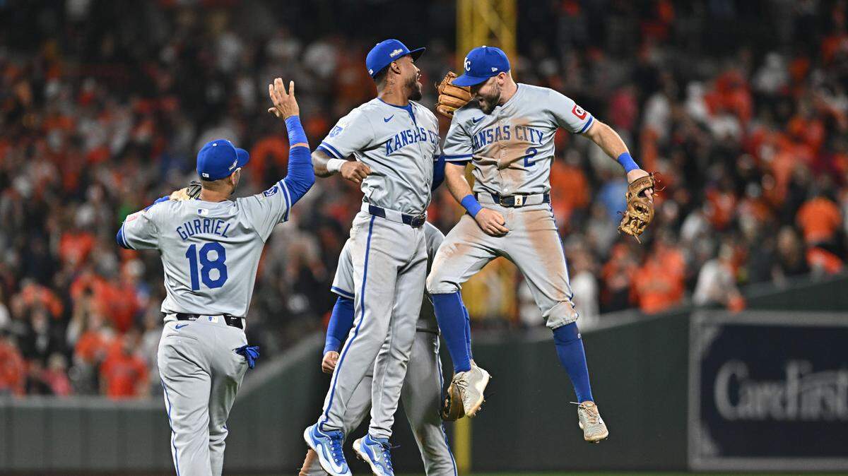 Kansas City Royals players including Garrett Hampson (2), Maikel Garcia (11) and Yuli Gurriel (18) celebrate after defeating the Baltimore Orioles in Game 2 of the Wild Card round at Oriole Park at Camden Yards on Oct. 2.
