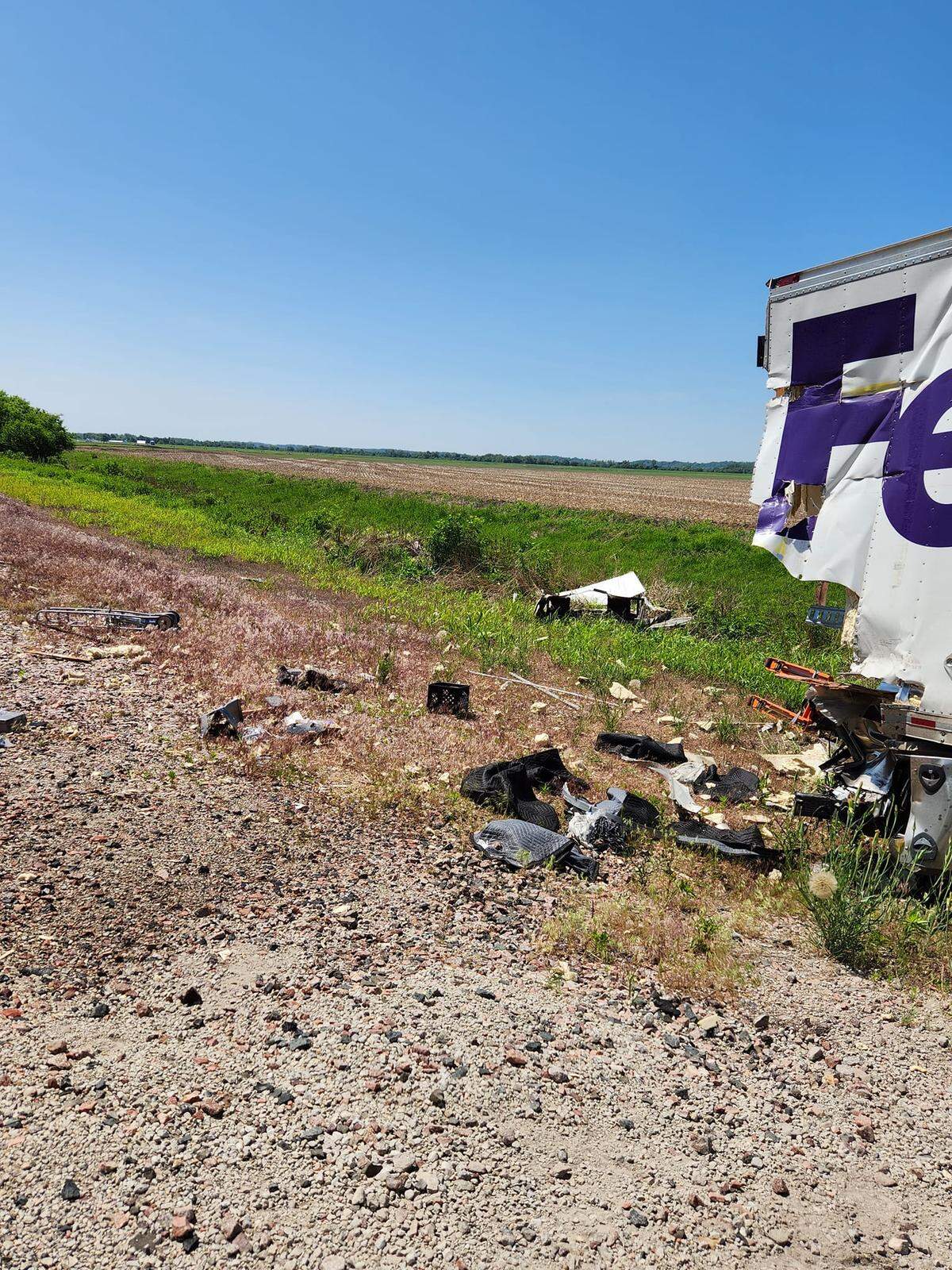 Authorities say a train crashed into a FedEx truck in Platte County, resulting in minor injuries that did not require hospitalization.