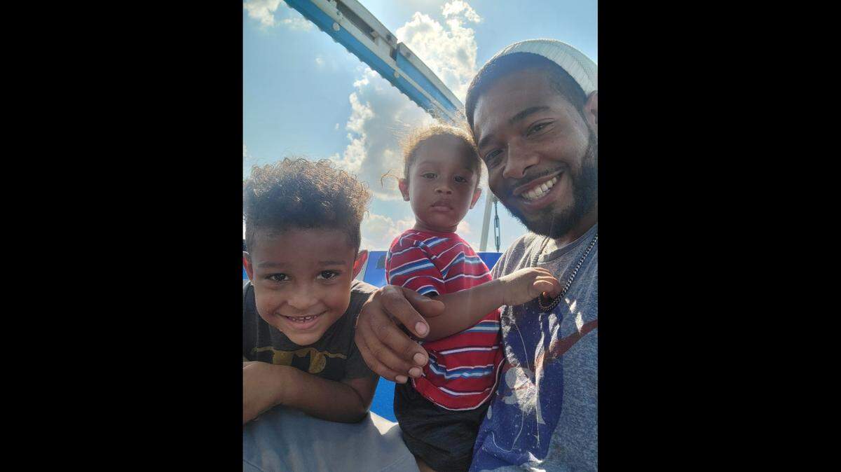 Juavvion Bagsby, 29, right, is pictured with two of his sons. Bagsby was shot and killed Sept. 29 during a confrontation with a man who had allegedly assaulted his wife and children at their home in Independence.