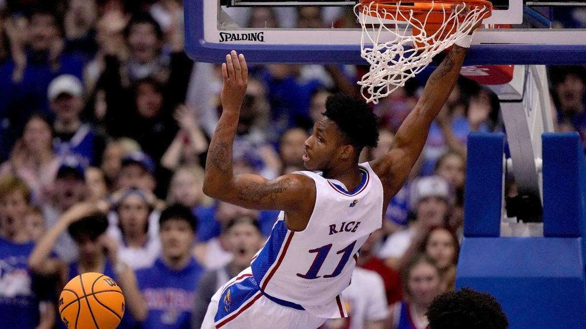 Kansas guard MJ Rice dunks the ball against Texas Southern on Nov. 28, 2022, in Lawrence.