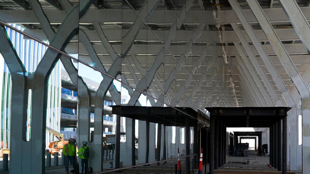 Work continued in November 2021 on the new Kansas City International Airport terminal. The curtain wall, or glass panels, have been installed in the front of the terminal.