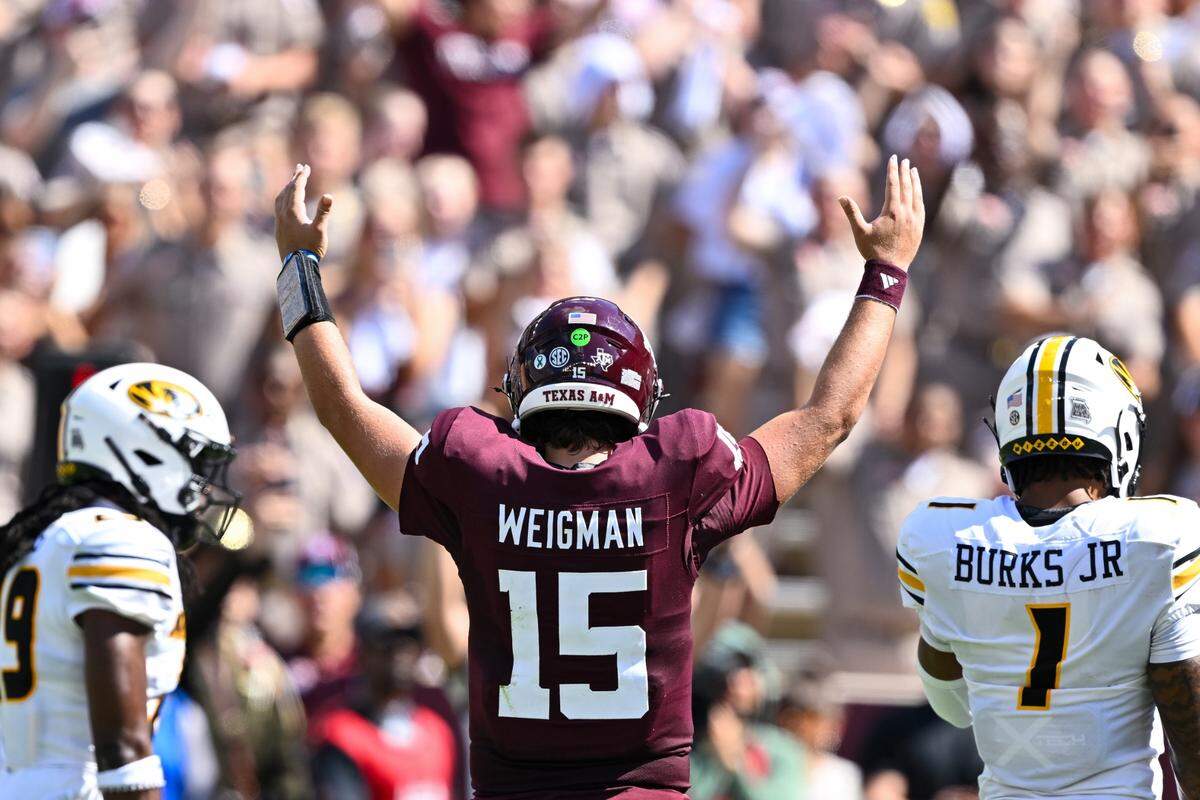 Texas A&M quarterback Conner Weigman celebrates a touchdown on Saturday against the Missouri Tigers at Kyle Field in College Station, Texas.
