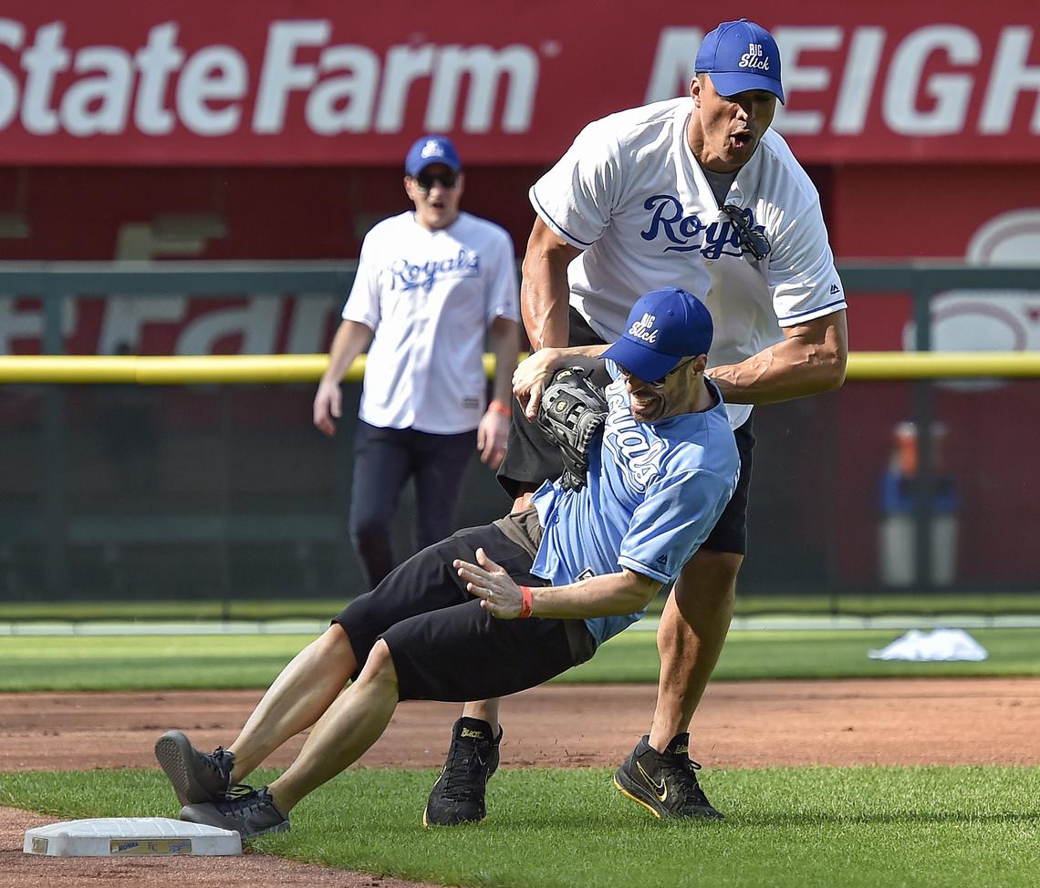 Former Kansas City Chief Tony Gonzalez tagged out "American Idol" star Chris Daughtry at third.