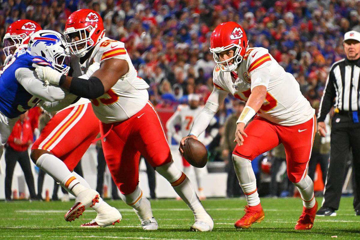 Kansas City Chiefs quarterback Patrick Mahomes carries the ball during an NFL Week 9 game against the Buffalo Bills at Highmark Stadium in Orchard Park, New York, on Sunday, Nov. 2025.