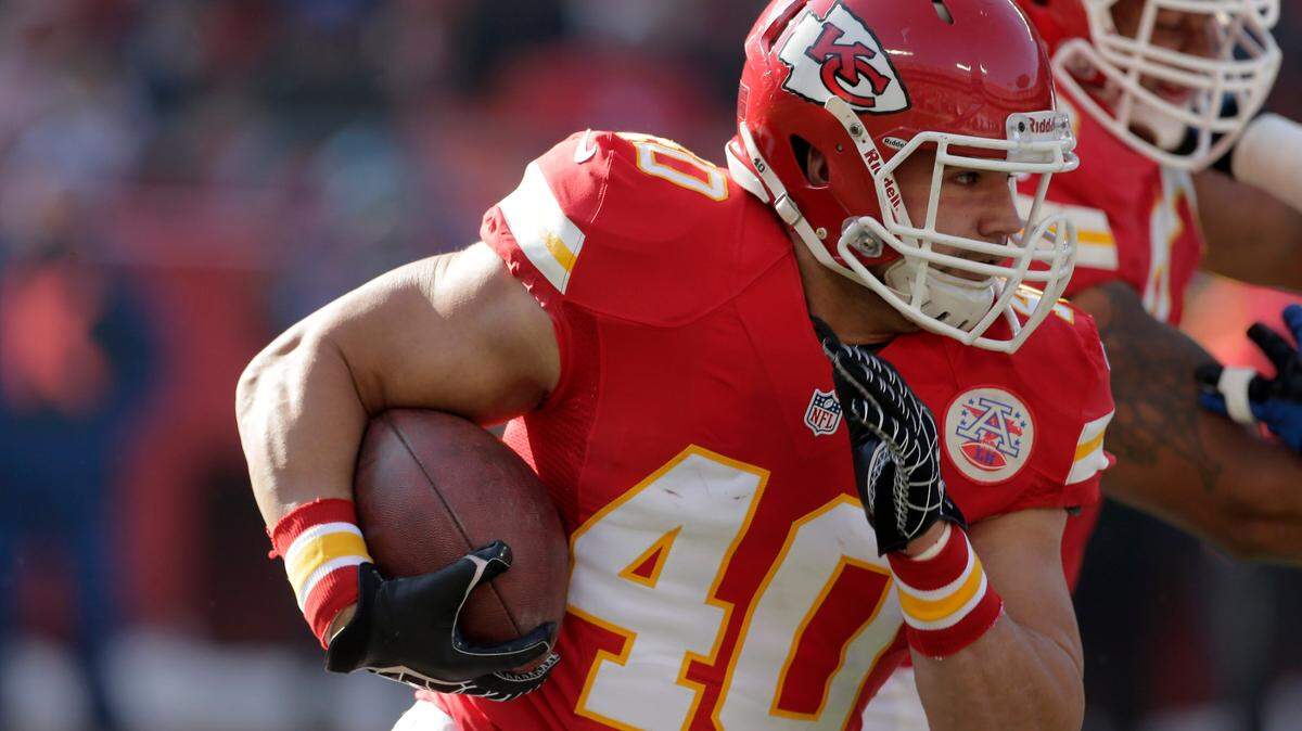 Kansas City Chiefs running back Peyton Hillis runs during the first half of an NFL football game against the Indianapolis Colts Sunday, Dec. 23, 2012, in Kansas City, Mo. (AP Photo/Charlie Riedel)