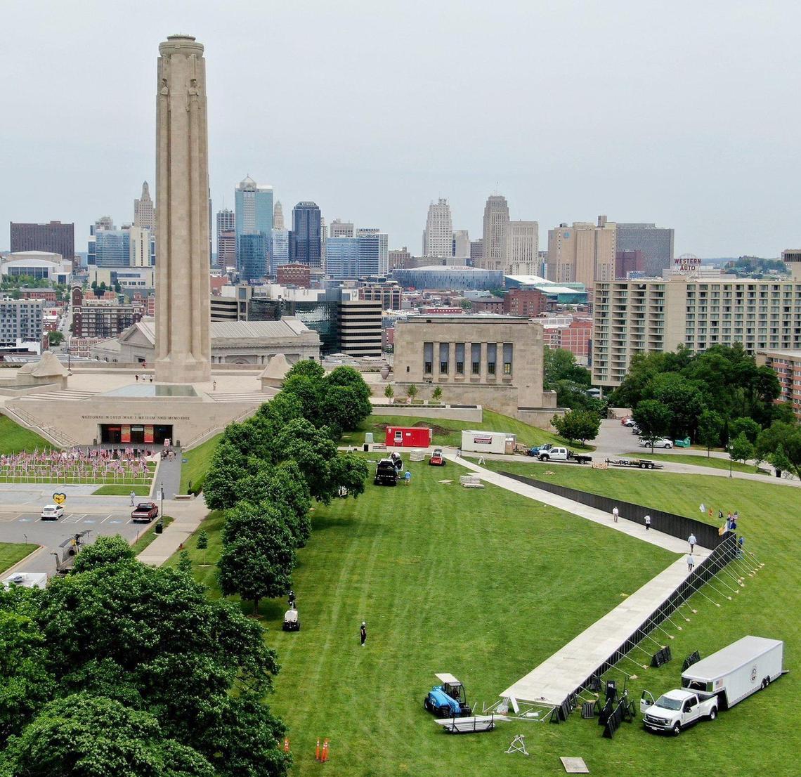 Workers prepare the AVTT Traveling Vietnam Wall on the southeast lawn of the National World War I Museum and Memorial Thursday, May 19, 2022.