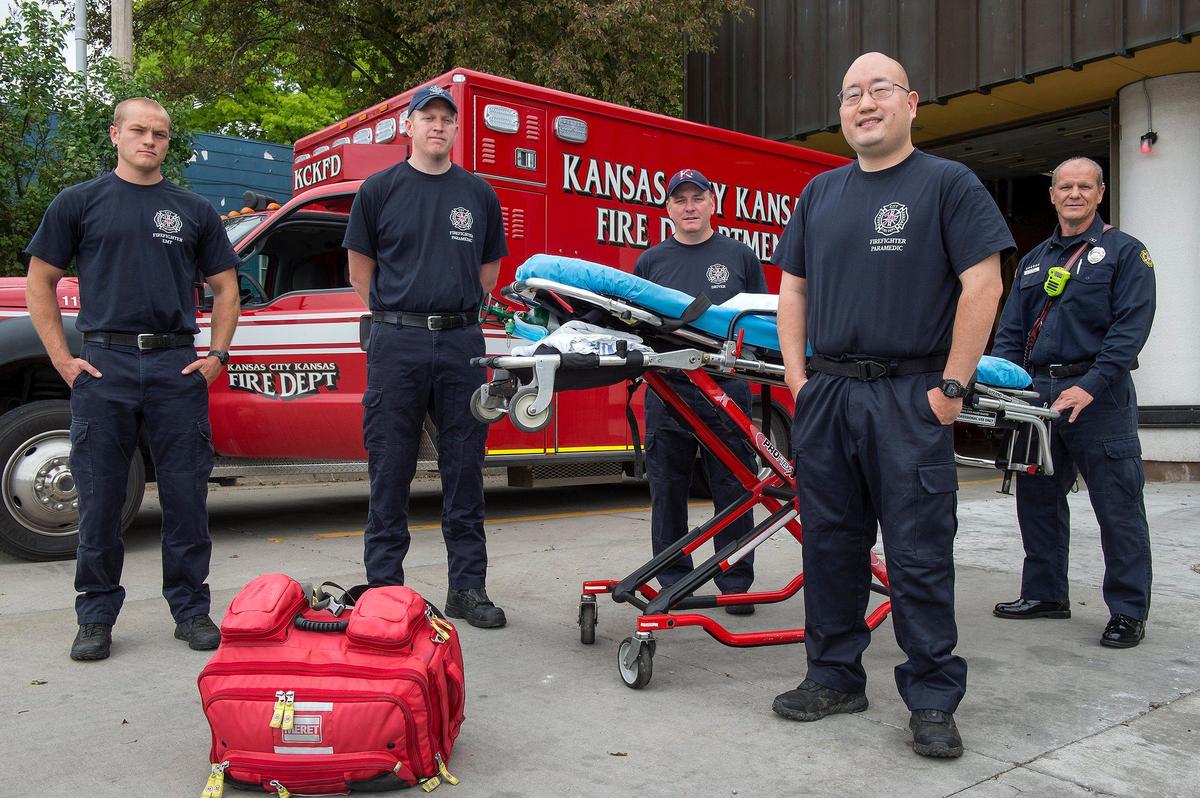Kansas City, Kansas Fire Department senior firefighter and paramedic Karl Tsen, (front, right) was on the crew that responded to the first COVID patient in Wyandotte County, who later died. Members of his team at Station 18 include Firefighter/EMT Kyle Cook, Firefighter/Medic David Adell, Driver Mark Burnau and Capt. Kelly Kloiber.