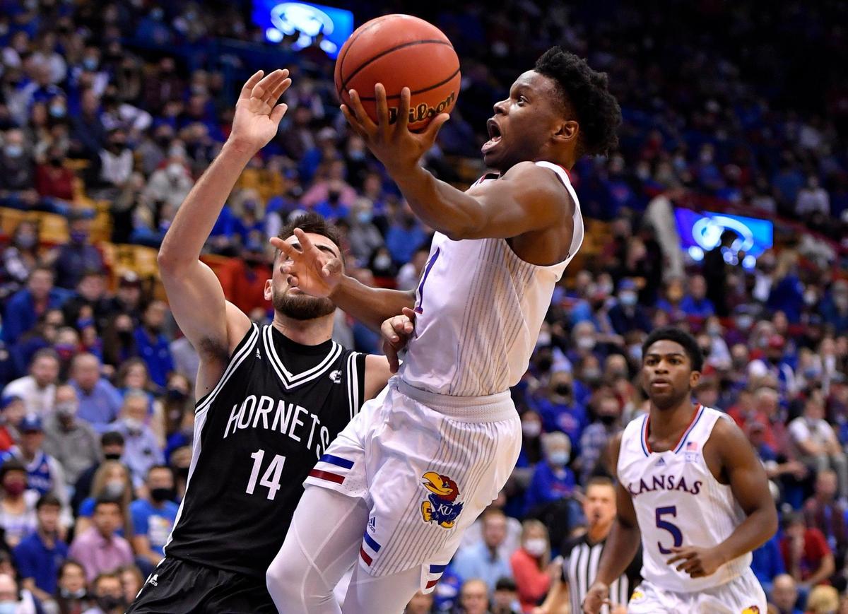KU’s Joseph Yesufu drives to the bucket as Emporia State’s Gage McGuire defends during the second half of Tuesday night’s exhibition game at Allen Fieldhouse in Lawrence.