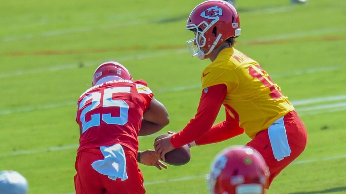 Kansas City Chiefs running back Clyde Edwards-Helaire (25) took a handoff from quarterback Patrick Mahomes (15) during training camp on Friday, July 30, 2021, at Western Missouri State University in St. Joseph, Missouri.