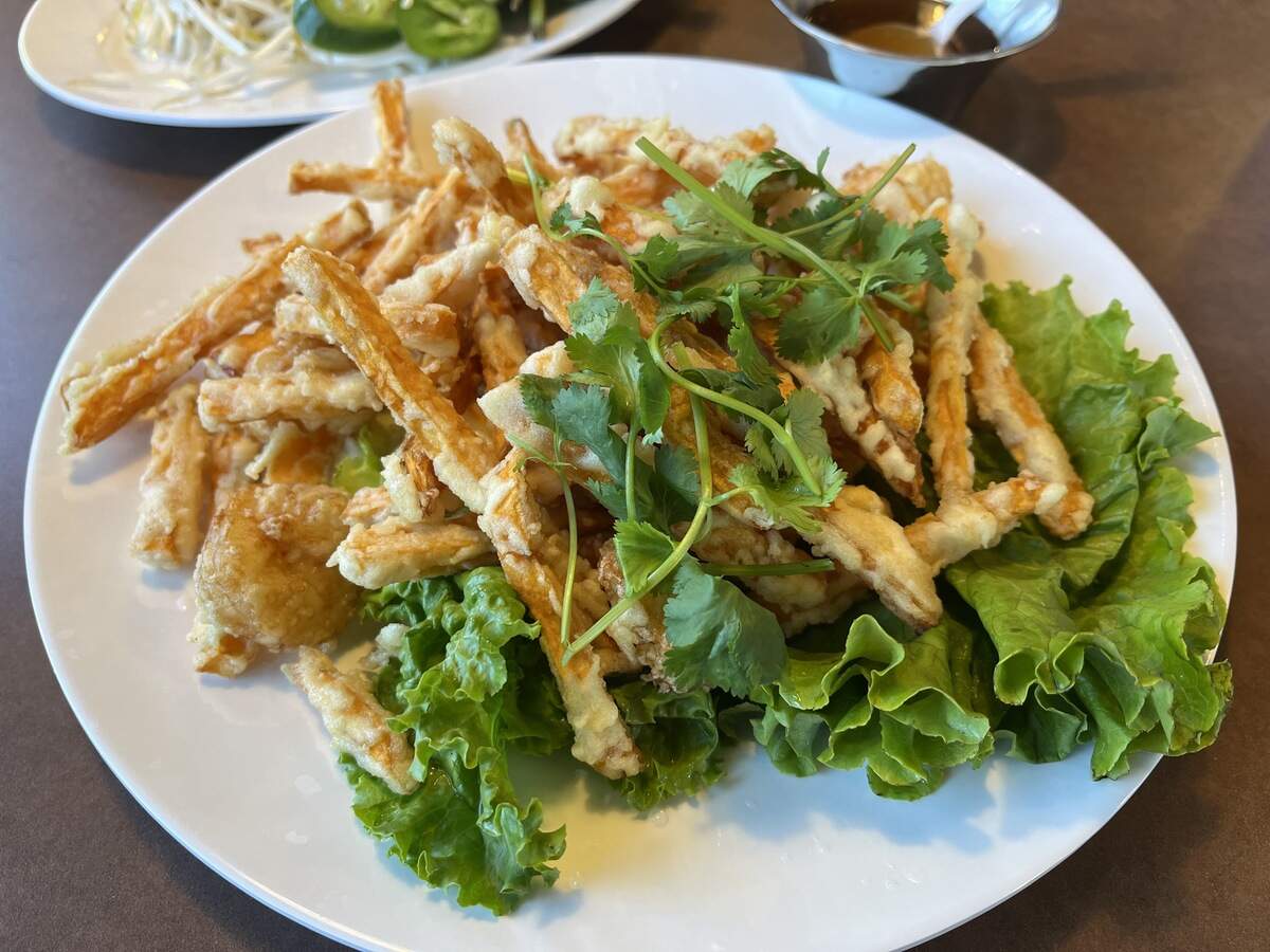 Vietnam Cafe’s Bánh Tôm Chiên appetizer (deep-fried sweet potatoes and shrimp served on a bed of lettuce with a side of house fish sauce; $6.99)