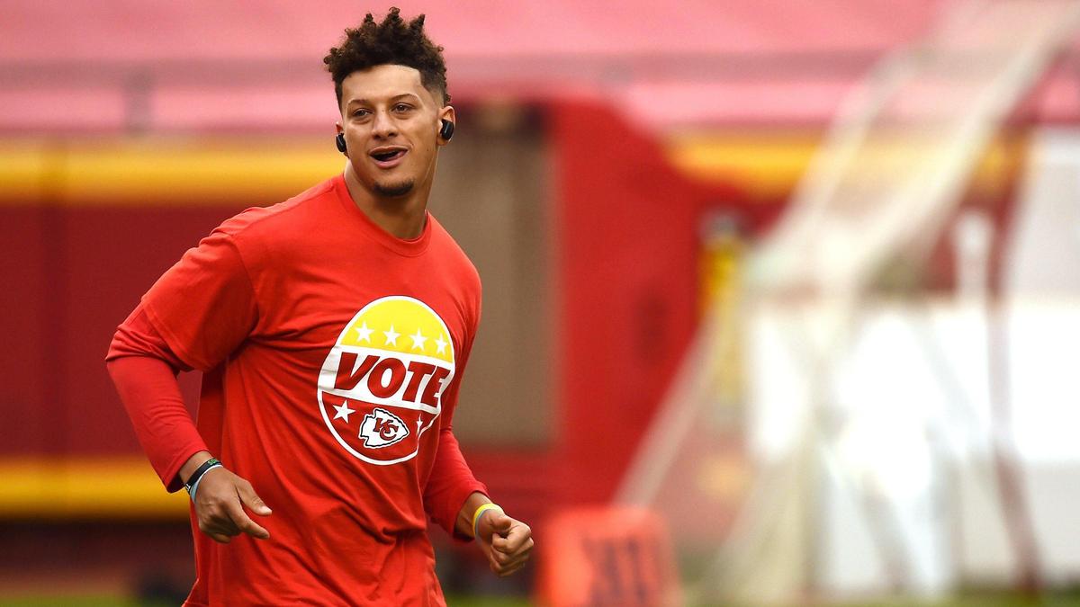 Kansas City Chiefs quarterback Patrick Mahomes warmed up in a shirt with a message to vote Thursday before the Chiefs took on the Houston Texans in the NFL season opener at Arrowhead Stadium.