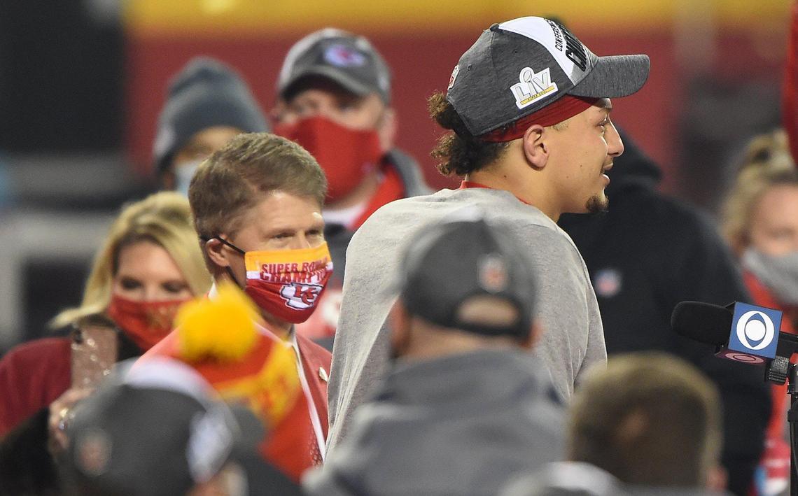 Clark Hunt, Chiefs Chairman and CEO, looks on as Chiefs quarterback Patrick Mahomes addresses the crown after the Chiefs won the AFC Championship Game against the Buffalo Bills on Sunday, Jan. 24, 2021, at Arrowhead Stadium in Kansas City.