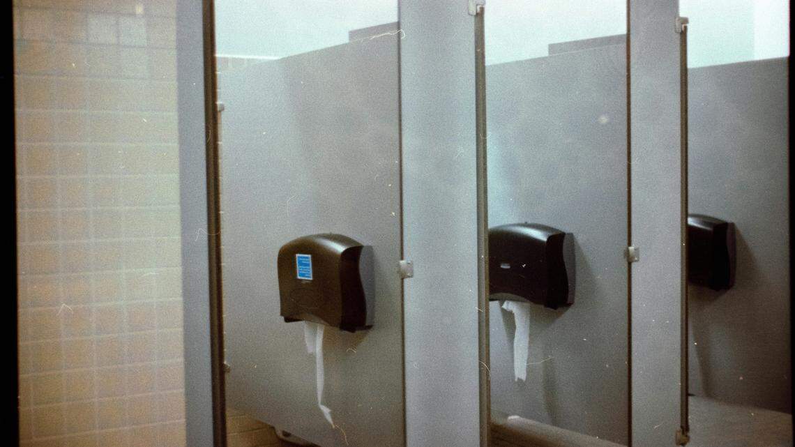 A former neurosurgery resident accused of filming hospital employees using the bathroom was sentenced to five years in prison, prosecutors said.