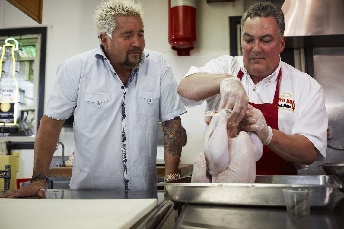 Danny Edwards, right, and his barbecue restaurant were featured on Guy Fieri’s “Diners, Drive-Ins, and Dives” on the Food Network in 2013.