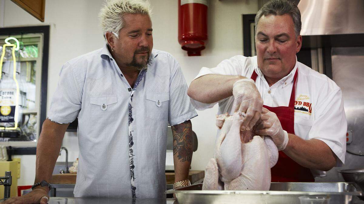 Danny Edwards, right, and his barbecue restaurant were featured on Guy Fieri’s “Diners, Drive-Ins, and Dives” on the Food Network in 2013.