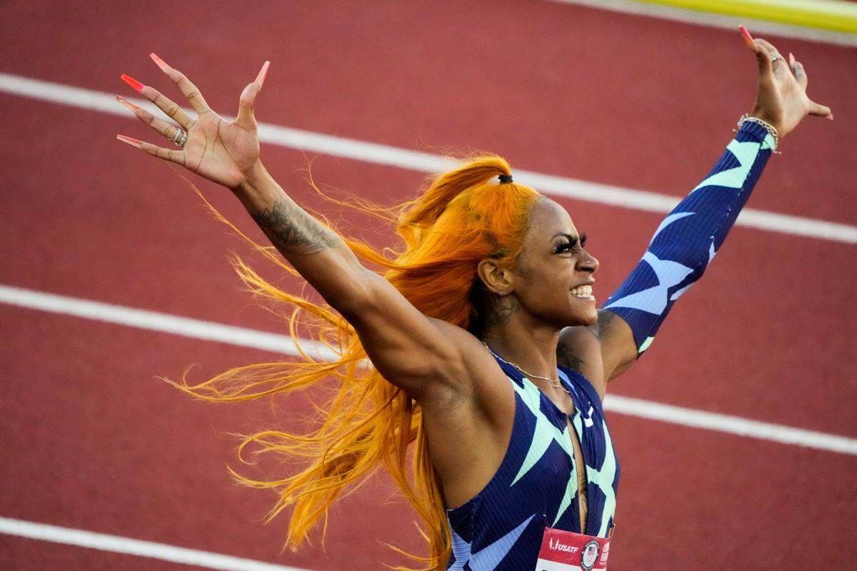 Sha’Carri Richardson celebrates after winning the women’s 100-meter run at the U.S. Olympic Track and Field Trials Saturday, June 19, 2021, in Eugene, Ore.