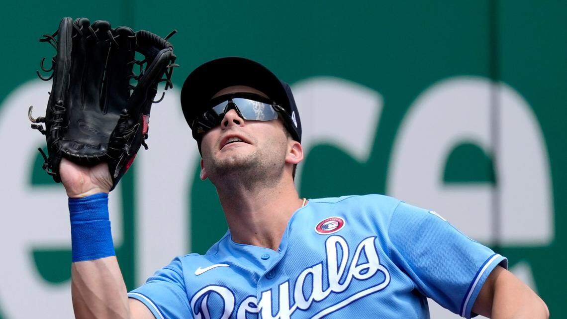 Kansas City Royals left fielder Andrew Benintendi catches a fly ball for the out on Minnesota Twins’ Jorge Polanco during the first inning of a baseball game Sunday, July 4, 2021, in Kansas City, Mo. (AP Photo/Charlie Riedel)