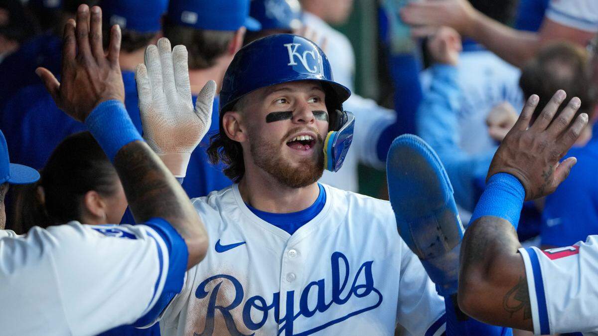 Kansas City Royals shortstop Bobby Witt Jr. (7) celebrates in the dugout after scoring against the Milwaukee Brewers in the fifth inning at Kauffman Stadium on May 7, 2024.