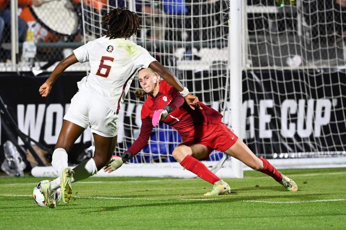 Goalkeeper Halle Mackiewicz, facing camera, defends the Clemson goal during a match against Florida State.