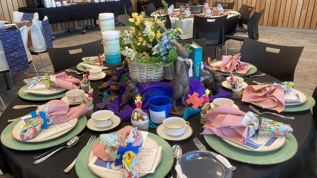 Groups from all over town pitch in to dress as many as 15 tabletops at a the Friends of the Olathe Public Library’s Novel Tea. Pictured is one of the tables “dressed” in 2022.
