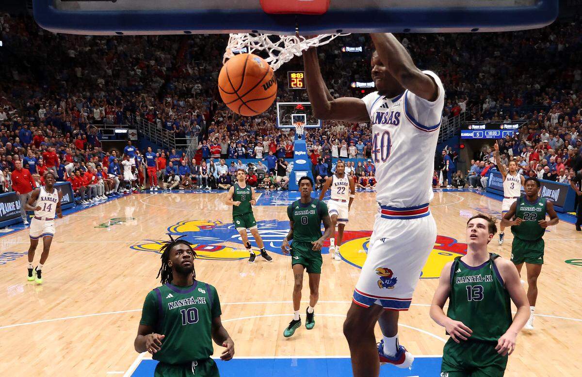 Forward Flory Bidunga #40 of the Kansas Jayhawks dunks during the first half of the game against the Green Bay Phoenix at Allen Fieldhouse on November 3, 2025 in Lawrence.