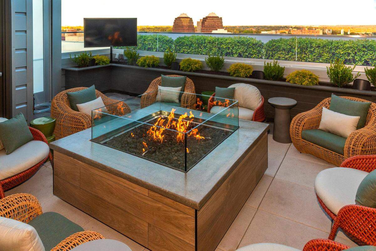 The outdoor patio of Prime Social, complete with a fire pit, offers views of the Country Club Plaza and more.