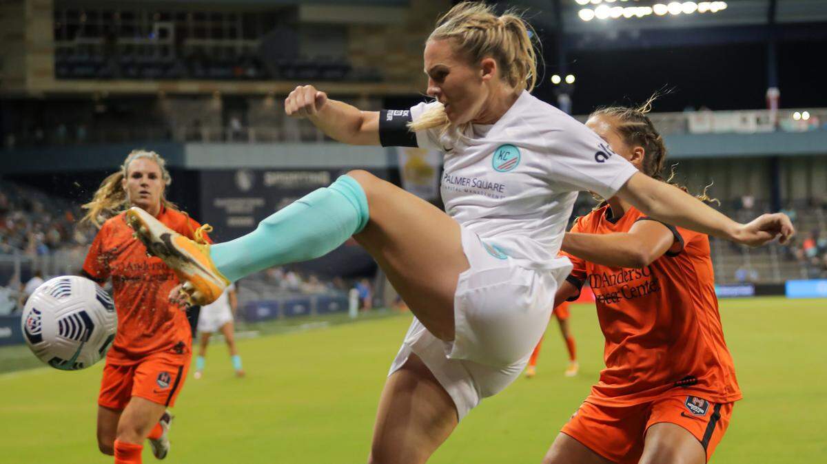 KC NWSL captain Amy Rodriguez plays the ball against the Houston Dash in Monday night’s home opener for Kansas City at Children’s Mercy Park.