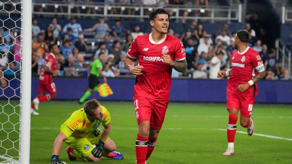 A Toluca player celebrates a goal as Sporting Kansas City goalkeeper Tim Melia (29) reacts during the second half of the match at Children’s Mercy Park on Aug. 5, 2024.