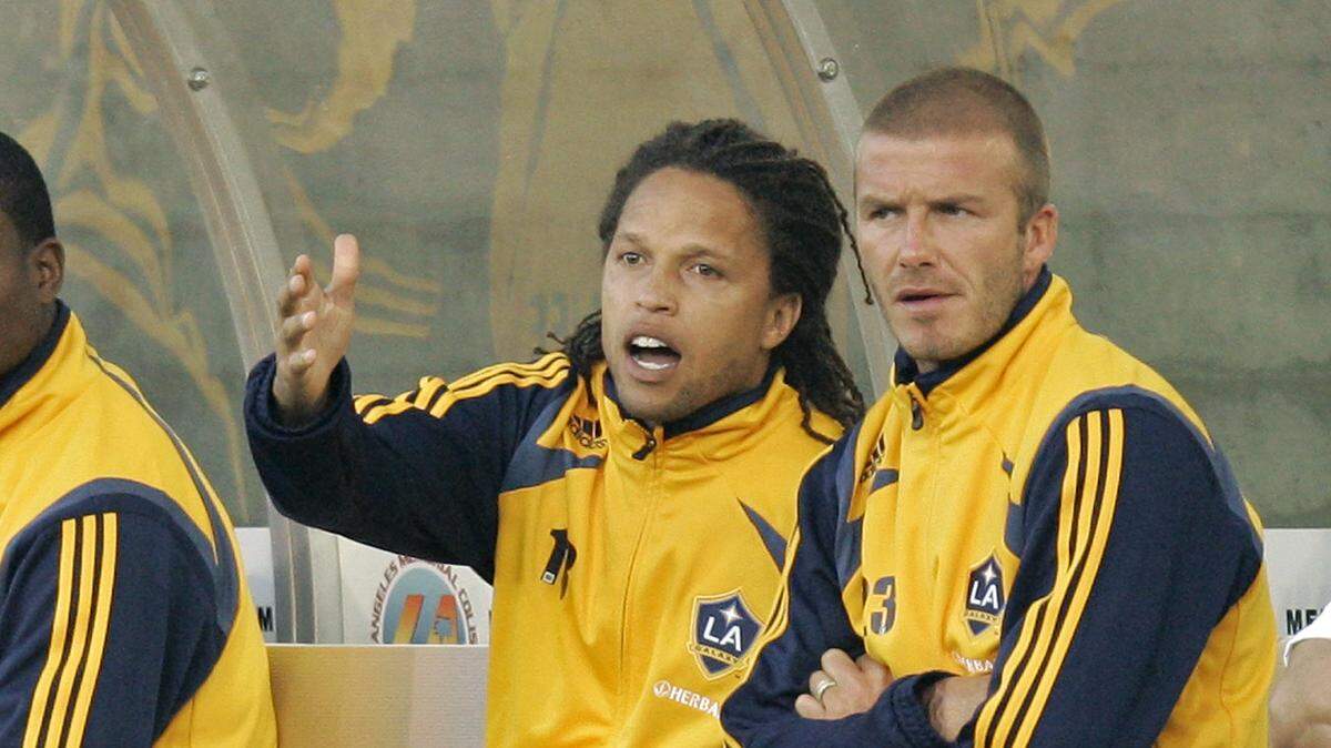Cobi Jones, shown here in this file photo with Los Angeles Galaxy teammate David Beckham (right), was the interim head coach of the Galaxy for a very short period in 2008.
