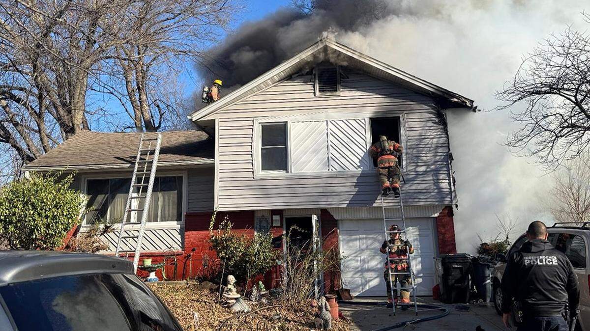 A woman and her two-year-old son were taken to an area hospital with critical injuries following a house fire in Independence Monday morning.