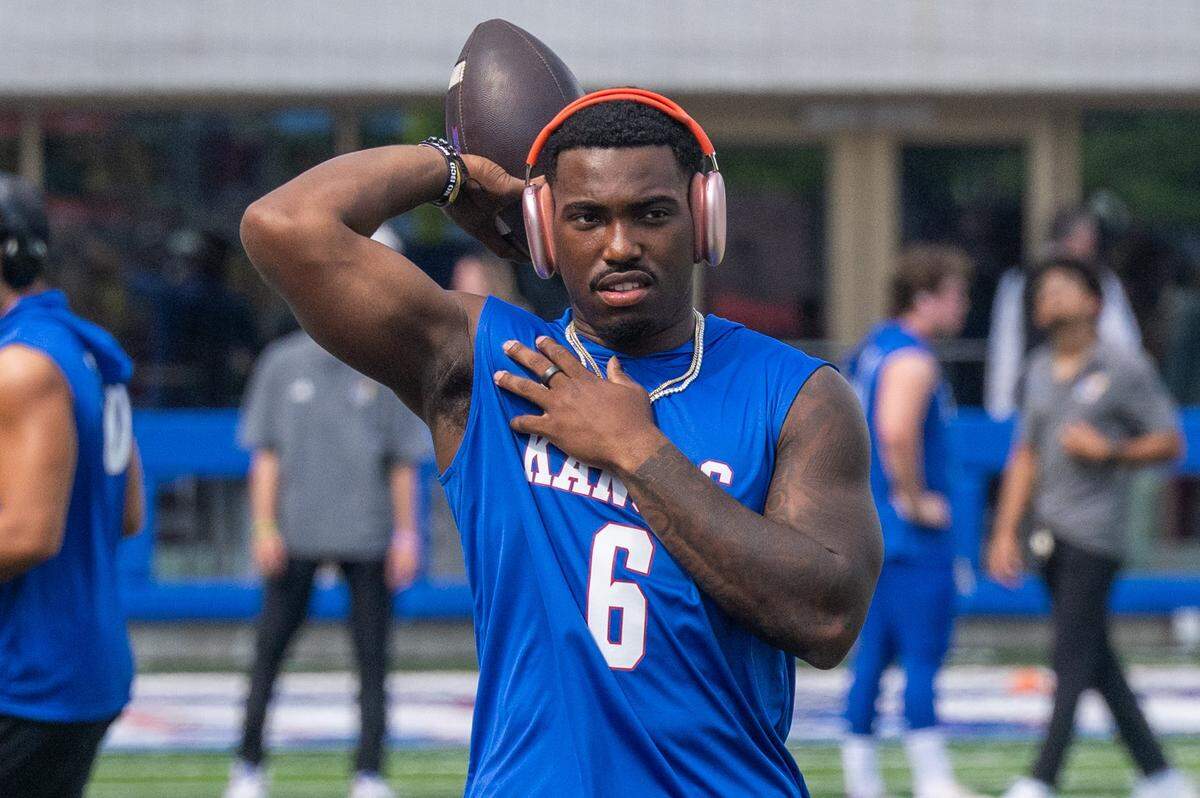 Kansas Jayhawks quarterback Jason Daniels warms up on the field at David Booth Kansas Memorial Stadium prior to the Jayhawks game vs. the Fresno State Bulldogs on Saturday, Aug. 23, 2025, in Lawrence.